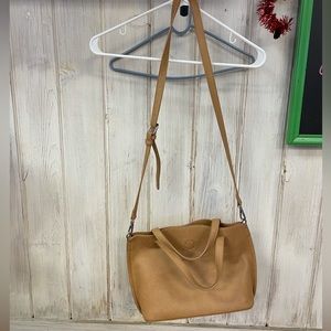 Light tan medium size cross bossy bag